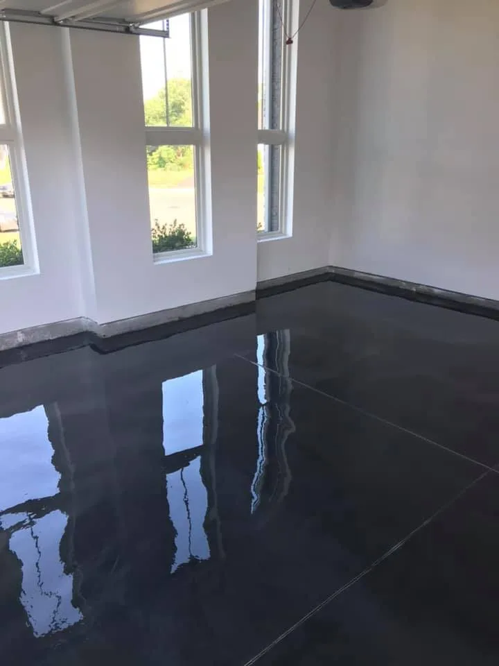 Finished decorative flake garage floor from the Ultimate Garage Floors project gallery